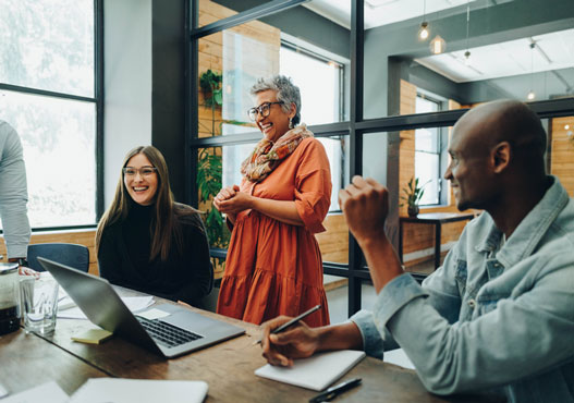 Happy people in a meeting.